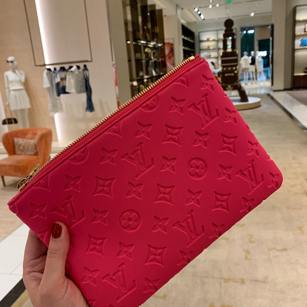 Authentic limited edition Louis Vuitton rare bright pink  soft logo pouch .Must!